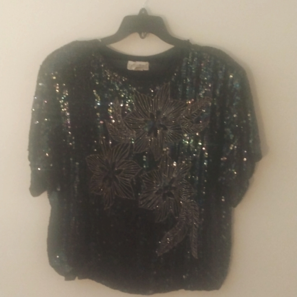 1X Black sequin top with an iredescent like rainbow look. Beaded flowers.
